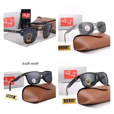 Four pairs of sunglasses with brown leather cases arranged on white