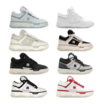 Nine low-top sneakers in white, cream, black and red laid out in three rows on white